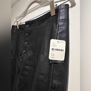 Never worn Free People vegan leather skinny pants. Size 12.